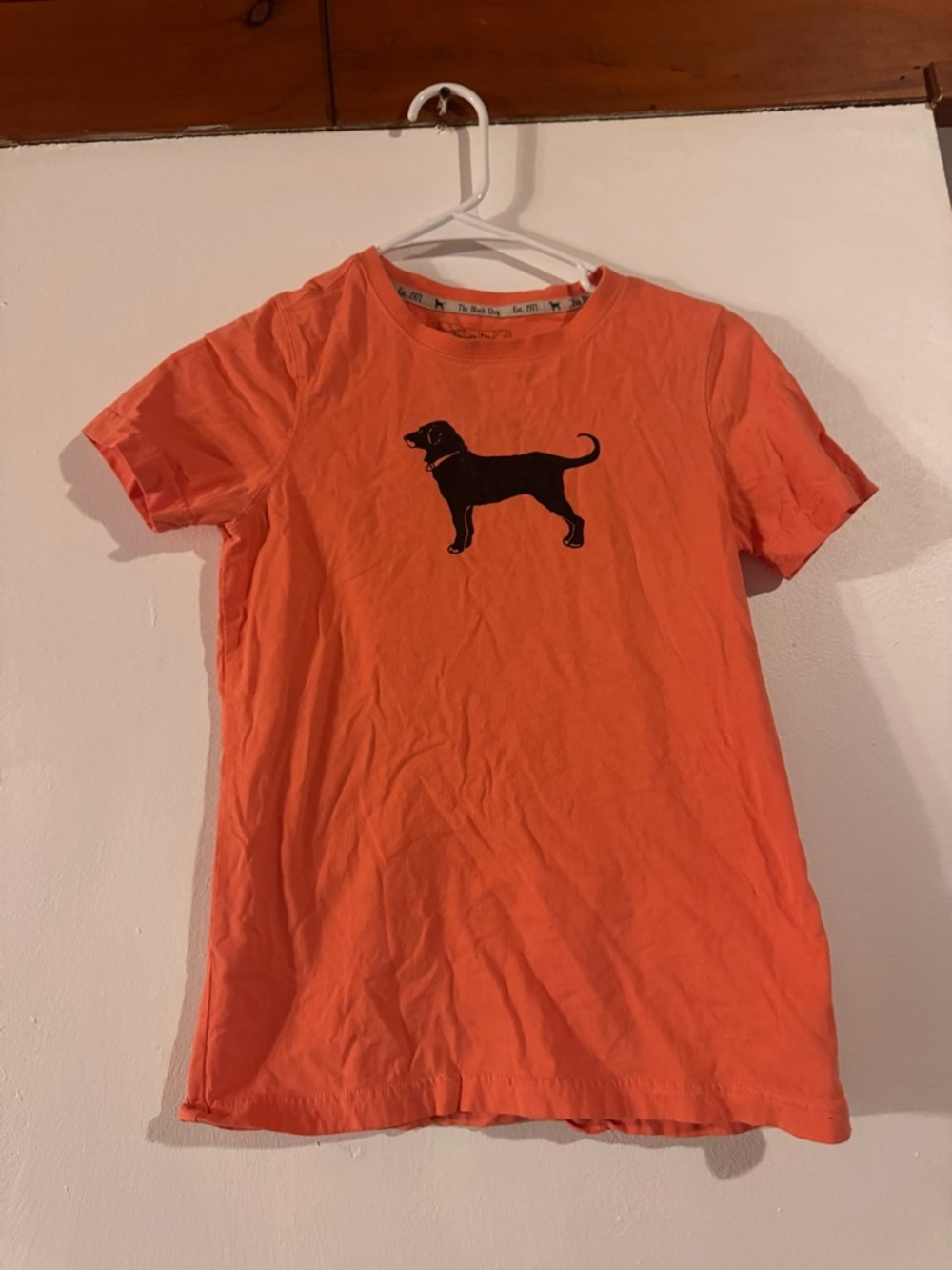 The Black Dog Orange Tee with Black Dog Silhouette